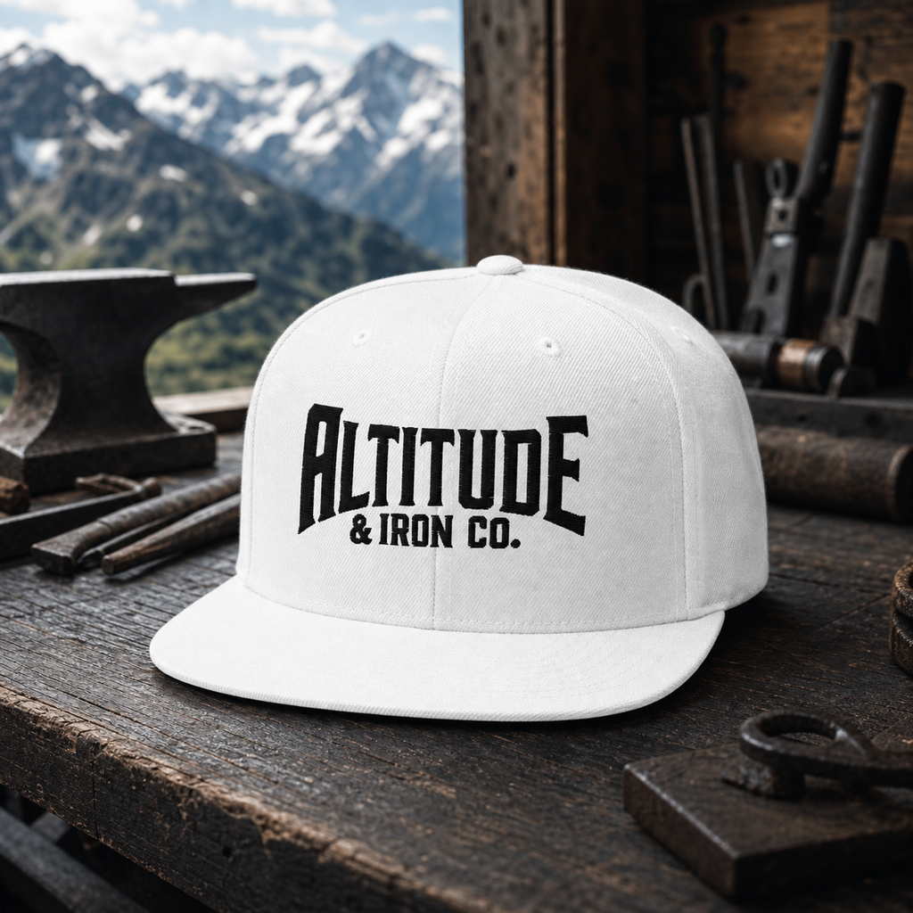 Classic Logo Snapback — White, an Altitude & Iron embroidered cap for tower climbers