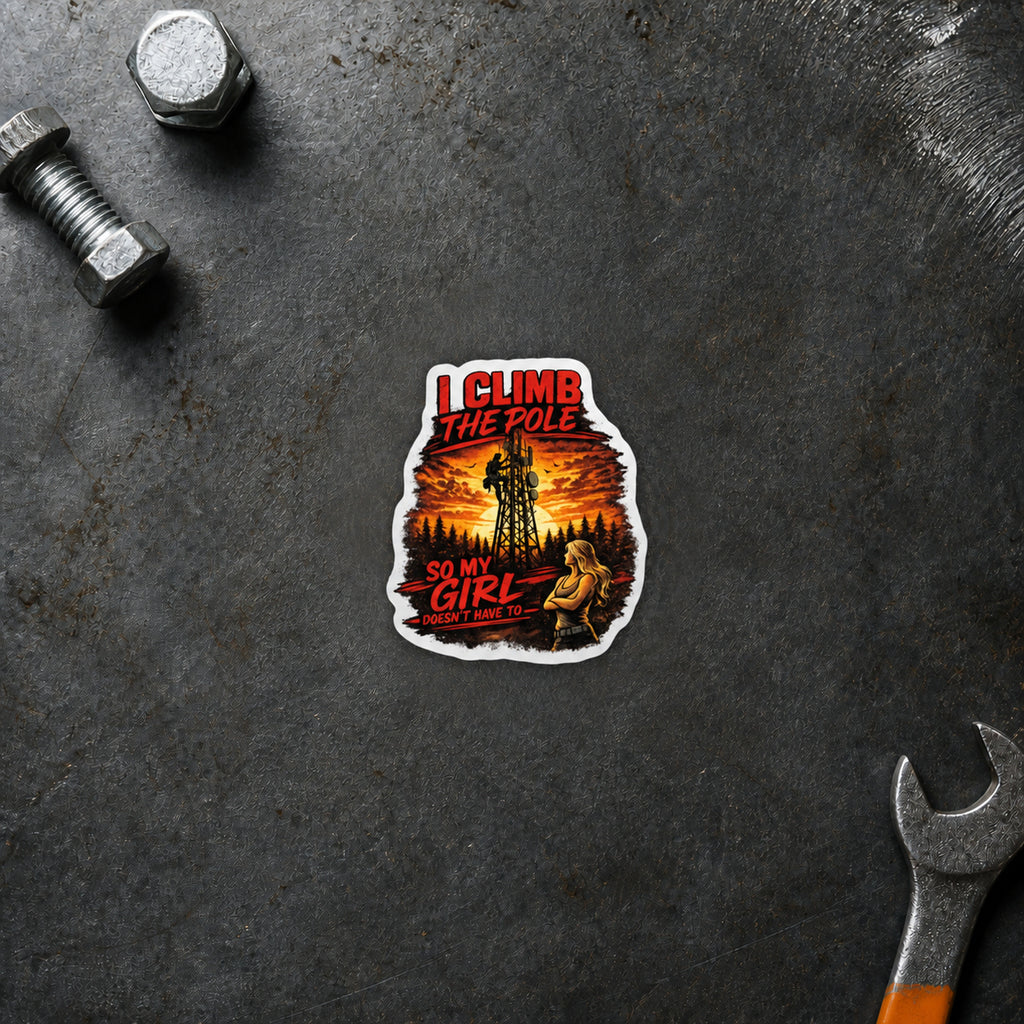 I Climb the Pole sunset sticker displayed on a steel workbench
