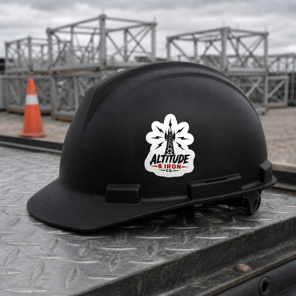 Signal tower logo sticker applied to a black hard hat