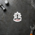 Signal tower logo sticker displayed on a steel workbench