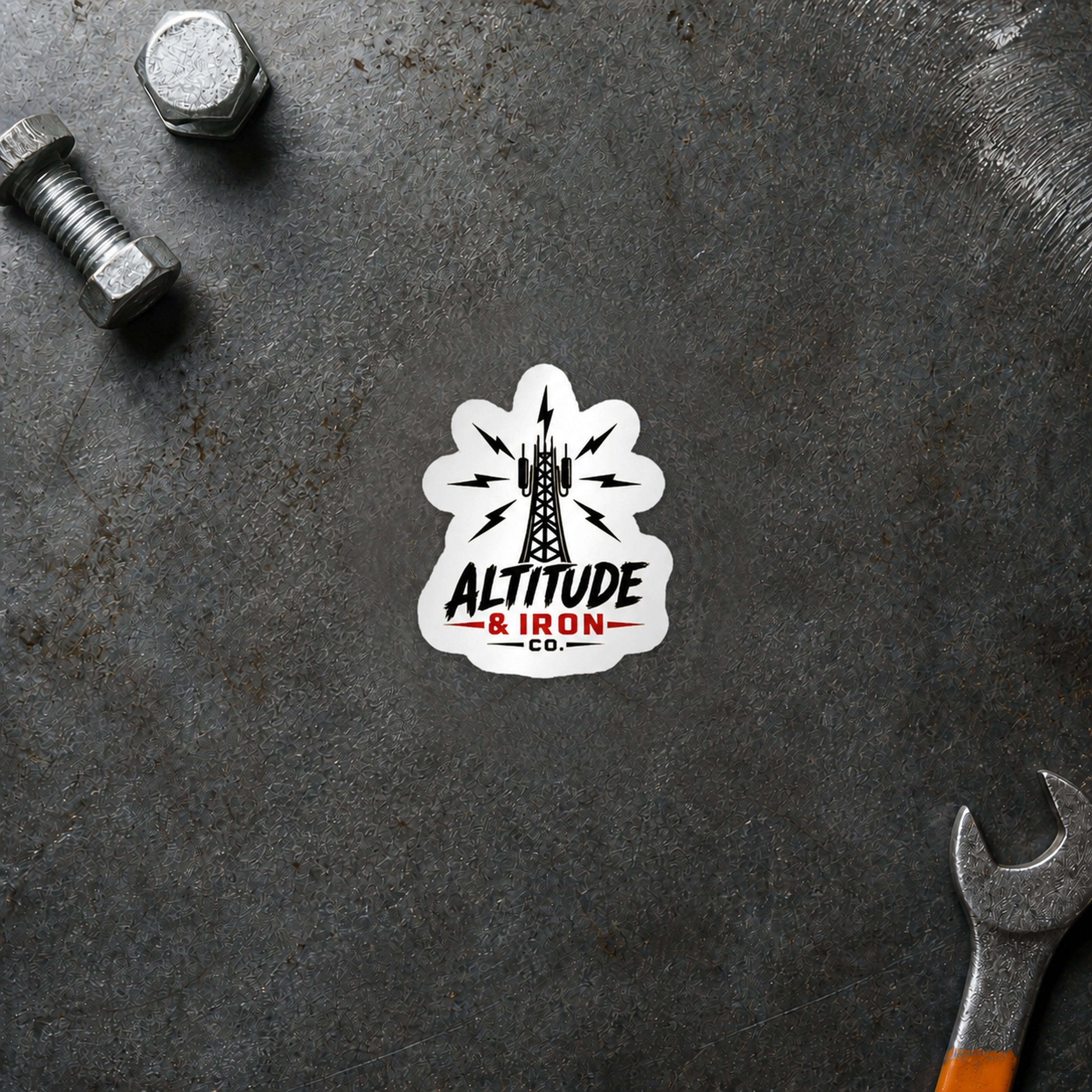 Signal tower logo sticker displayed on a steel workbench