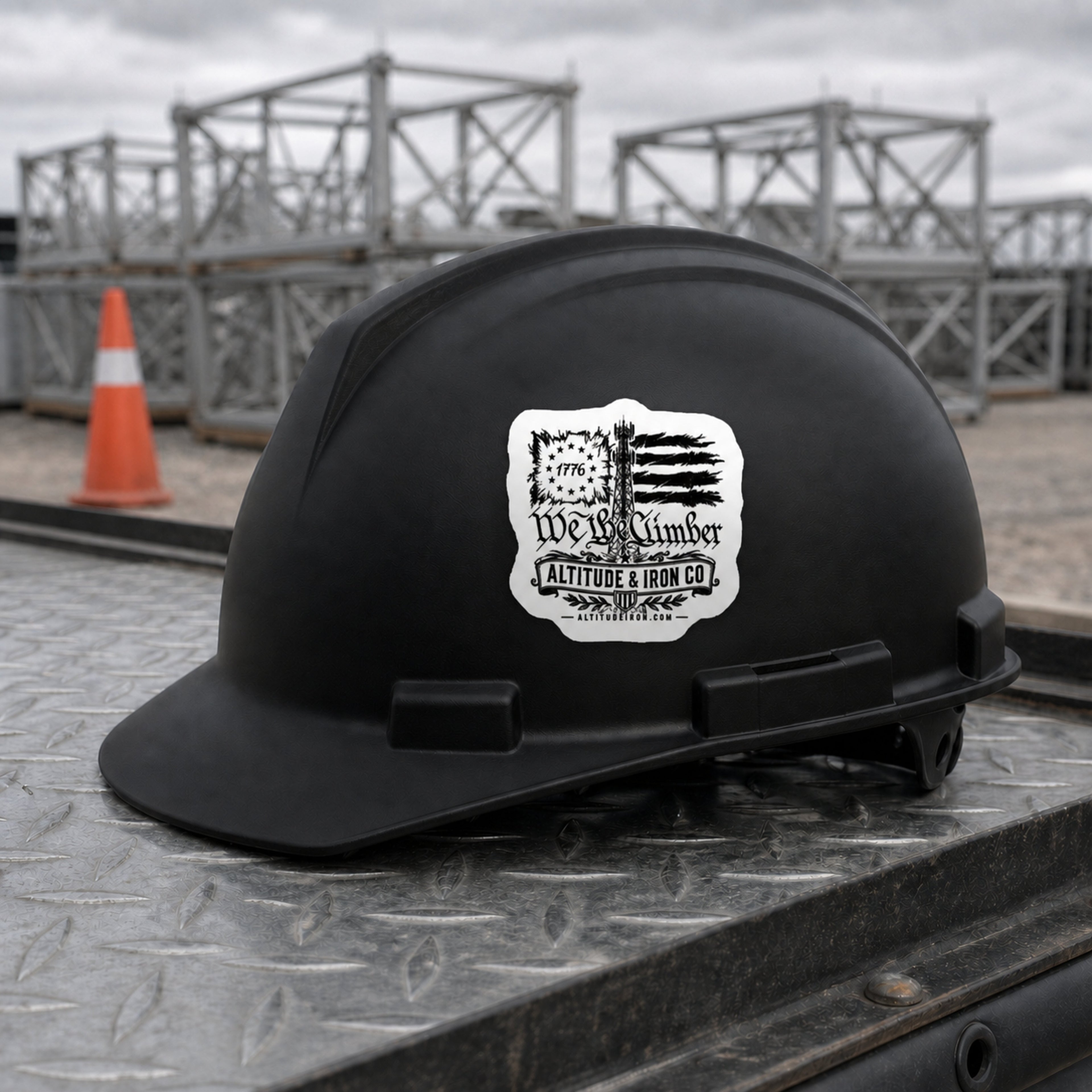 We the Climber sticker applied to a black hard hat